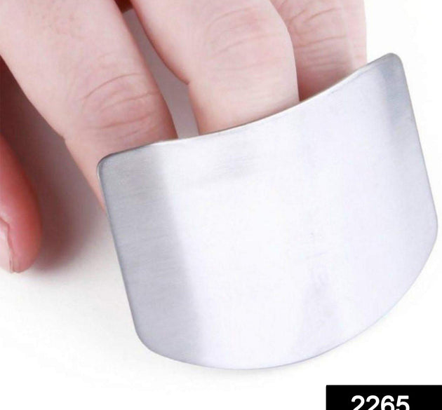 Stainless steel finger guard for safe cutting in kitchen.