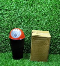 Compact car dustbin for efficient trash storage.