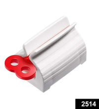 Rolling tube toothpaste squeezer with stand holder