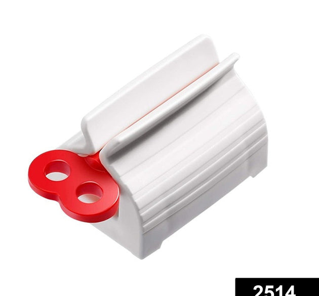 Toothpaste squeezer and holder stand for rolling tubes