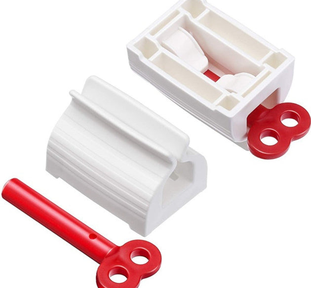 Toothpaste squeezer and holder stand for rolling tubes