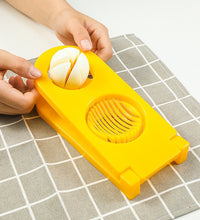 Detailed view of 2-in-1 egg cutter and slicer tool