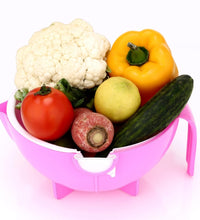 Multi-functional vegetable shredder with built-in drain basket.