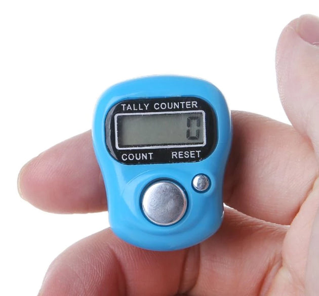 Digital tally counter with a manual hand finger counting mechanism.