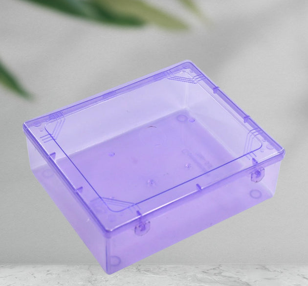 Transparent plastic storage container with lid, ideal for storing household items and organizing spaces.