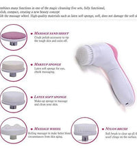 Pink 5-in-1 massager for body and face care.