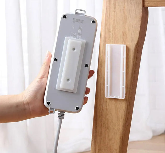 Self-adhesive wall mount plug organizer