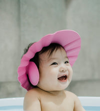 Adjustable baby bath cap to prevent water from getting in the eyes.