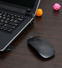 Wireless mouse for laptop, PC, Mac, and iPad, sleek design.