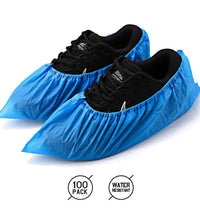 Plastic rain shoe covers with elastic, designed for outdoor use.