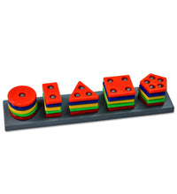 Educational toy blocks with geometric shapes in a box