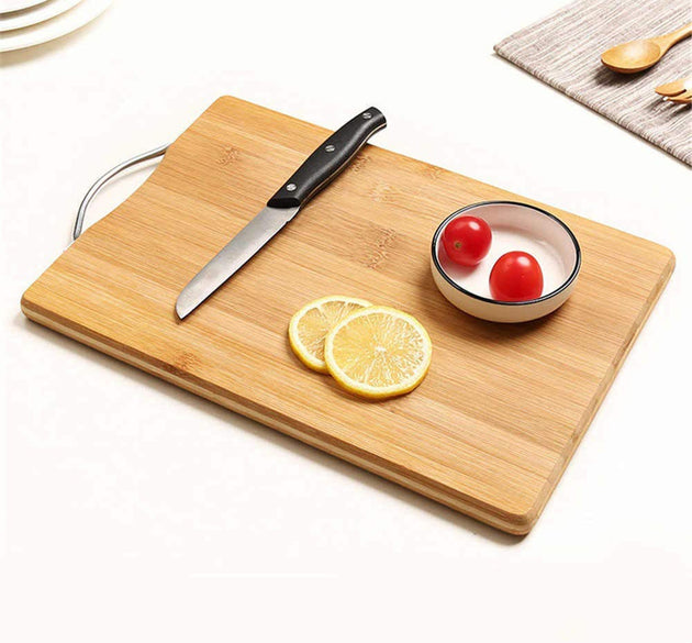 Wooden chopping board with anti-slip mat for safety.