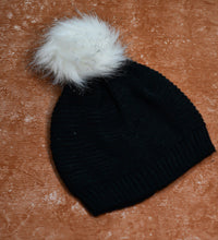 Skull slouchy beanie cap with black inside fur.