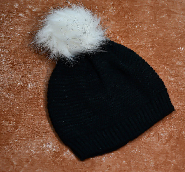 Skull slouchy beanie cap with black inside fur.