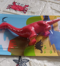 Red dinosaur shaped eraser