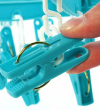 360-degree rotatable hanger with 24 clips for efficient drying.