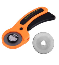 Manual sewing roller cutter with comfortable grip and rotary blade