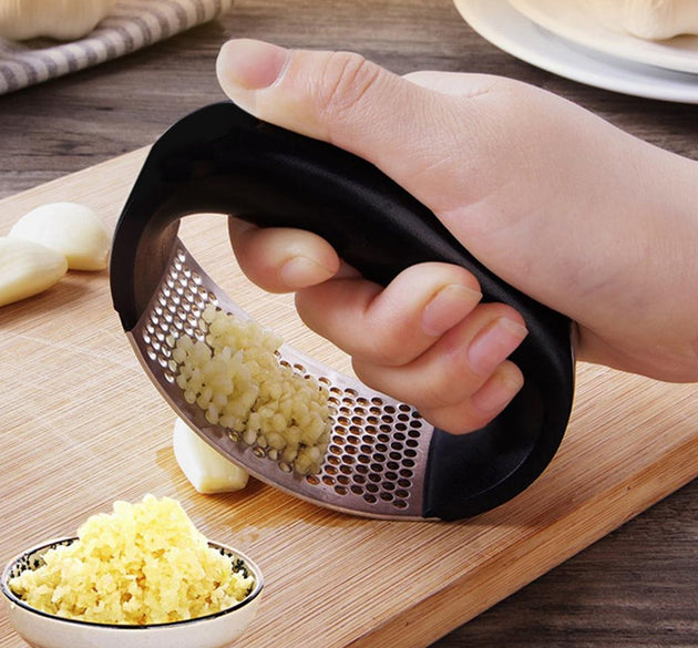 Garlic press tool