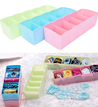 Storage box with 5 compartments for efficient organization of socks and handkerchiefs.