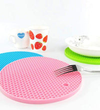 Silicone hot mat designed to protect surfaces from hot cookware with a flexible material.