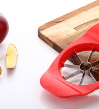 Ganesh apple cutter, plastic and stainless steel, available in various colors.