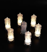 Large flameless candles with a melted design.