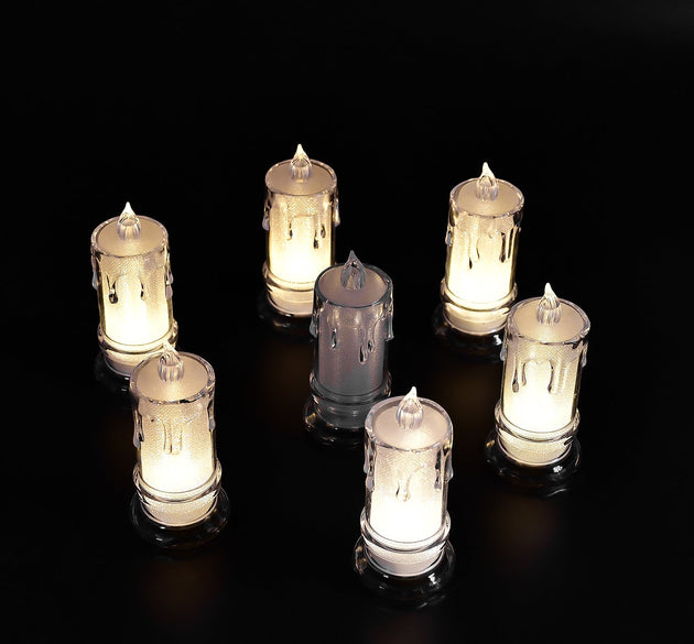 Large flameless candles with a melted design.