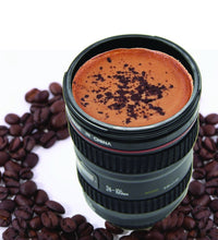 Stainless steel mug with a plastic camera lens design, showcasing its distinctive appearance