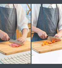 Wooden chopping board with non-slip base for stability.