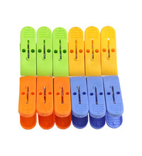 Strong plastic clips for cloth drying in assorted colors.