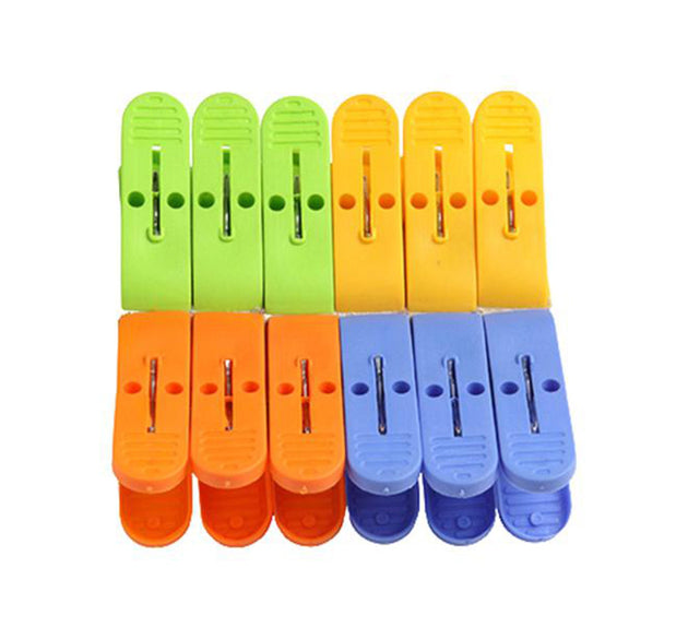 Strong plastic clips for cloth drying in assorted colors.