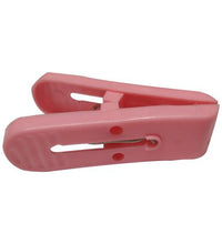 Sturdy plastic clips for drying clothes in multicolour.