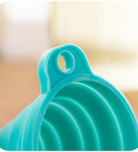 Close-up of silicone funnel for pouring.