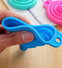 Multi-use silicone funnel for sauces and liquids.