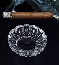 Glass crystal ashtray for cigar or cigarette.