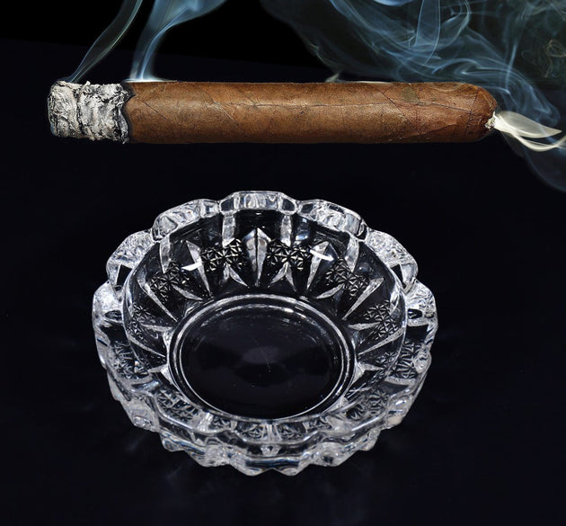 Glass crystal ashtray for cigar or cigarette.