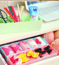 Pack of 2 storage boxes for organizing socks and undergarments with 5 compartments each.