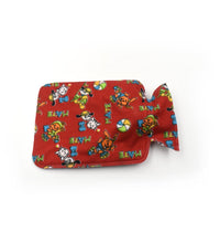 Small rubber heating pad bag for hot water and pain relief.