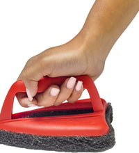 Brush with abrasive scrubber for tough stains