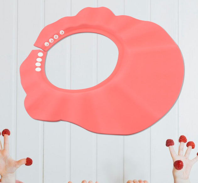 Adjustable baby shower cap protecting eyes and ears