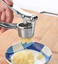 Multi-function masher and squeezer tool