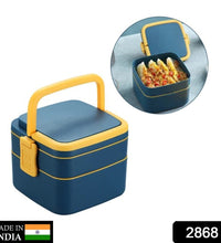 Stackable blue lunch box with carrying handle and spoon