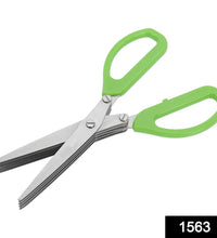 Close-up of stainless steel herb scissors with multiple blades