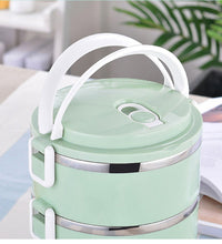 Stainless steel hot lunch box with three compartments.