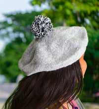 Warm winter beret cap in stylish design, suitable for men and women.