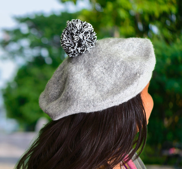 Warm winter beret cap in stylish design, suitable for men and women.