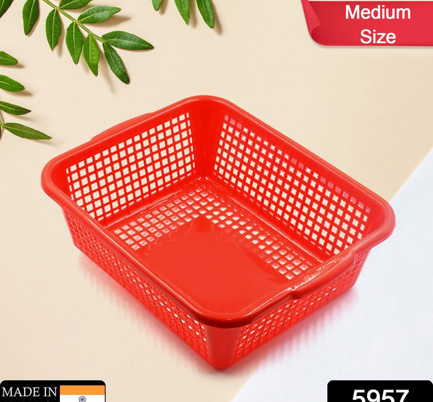 Medium size plastic washing basket for vegetables and fruits, versatile dish rack organizer.