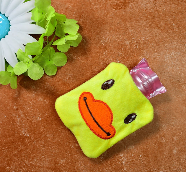 Yellow duck hot water bag with cover for pain relief and warming