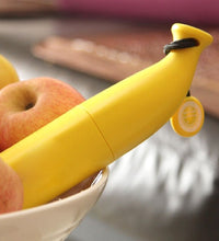 Foldable banana-shaped mini umbrella, compact and stylish.