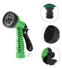 Plastic garden hose nozzle with spray options.